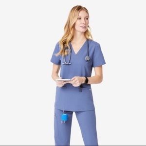 Limited edition color, double pocket scrub top